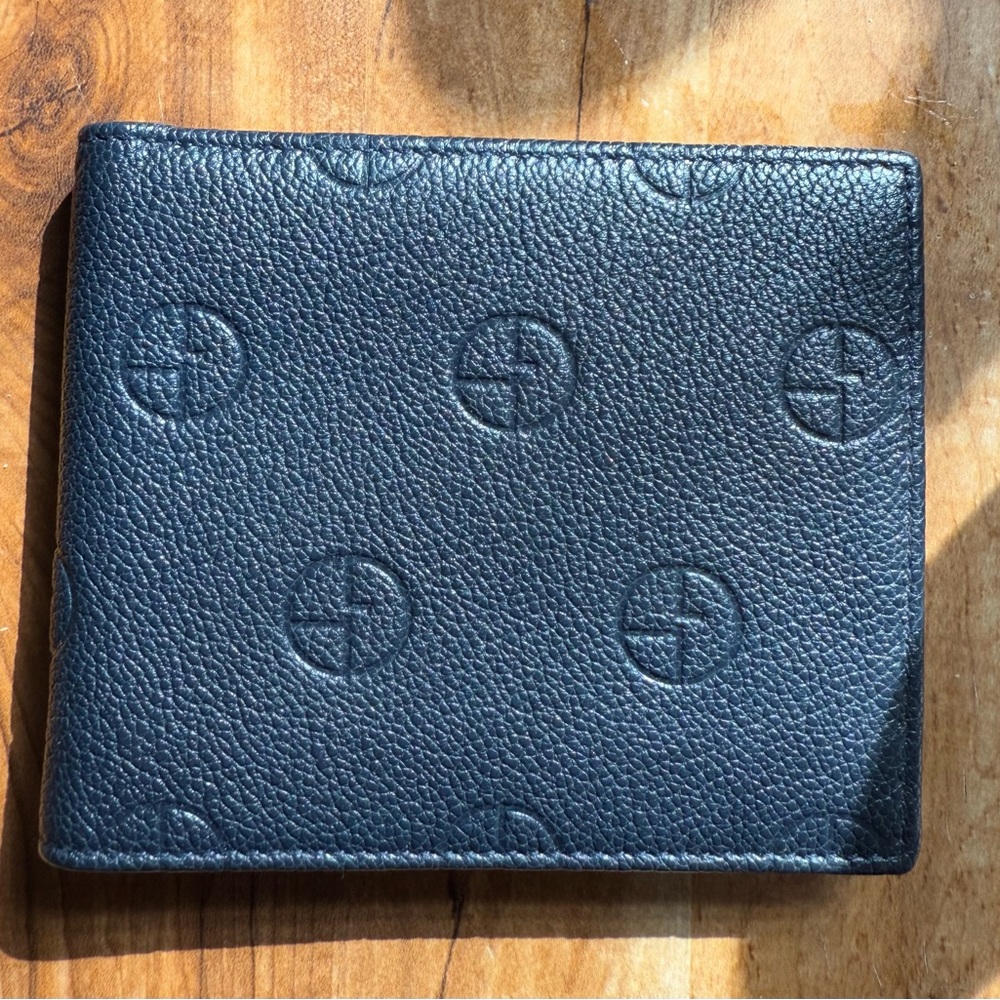 GIORGIO ARMANI made in Italy navy blue wallet with all over logo. Bifold.$1,200